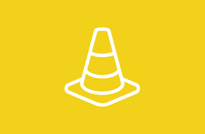 A graphic icon of a traffic cone is depicted.